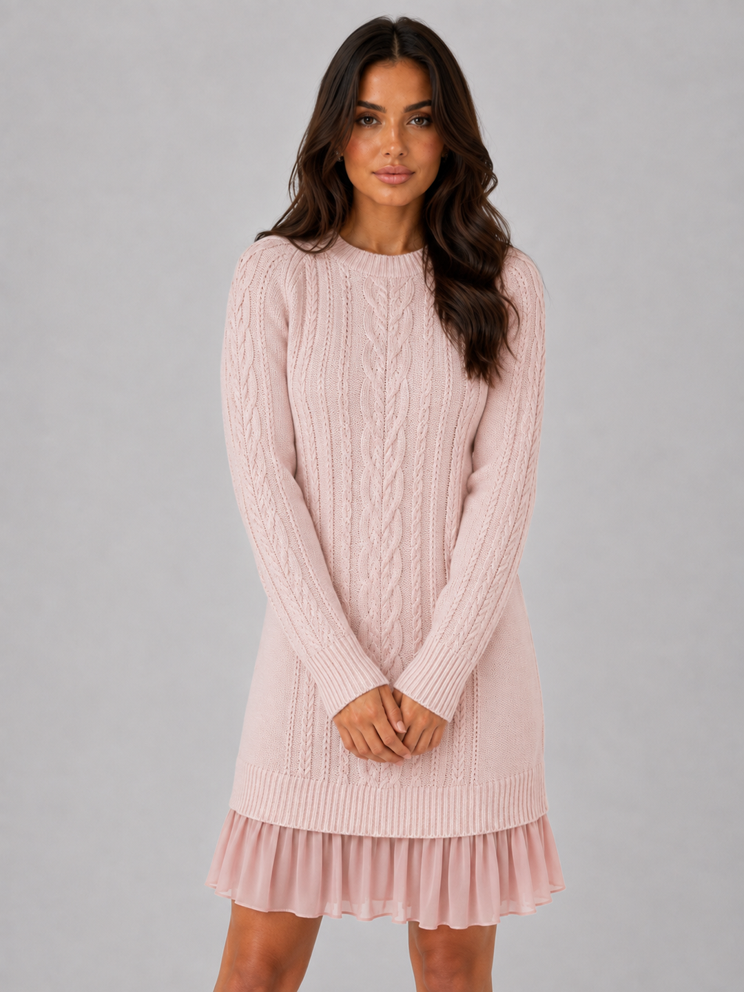 Women's pink cable knit jumper dress with pleated hem and crew neck