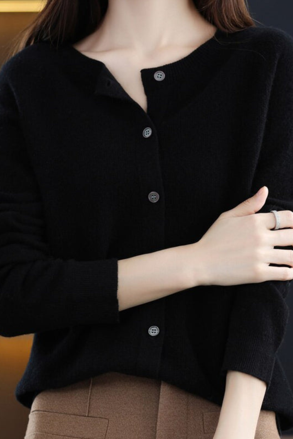 Women's long-sleeve button-front cardigan with round neckline and ribbed trims