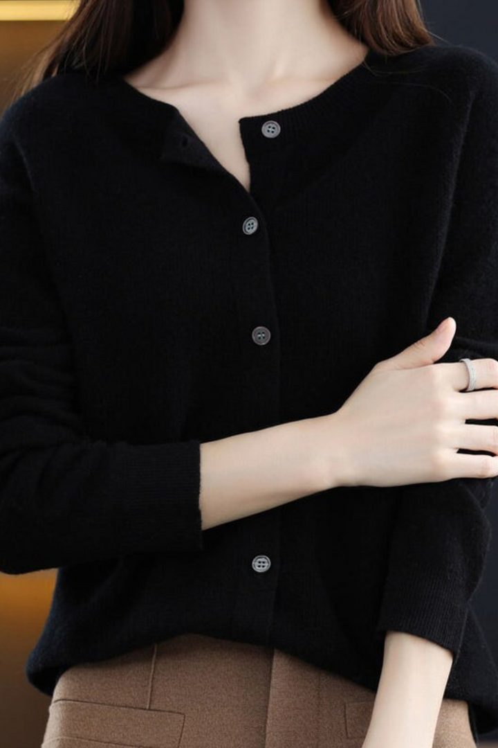 Women's long-sleeve button-front cardigan with round neckline and ribbed trims