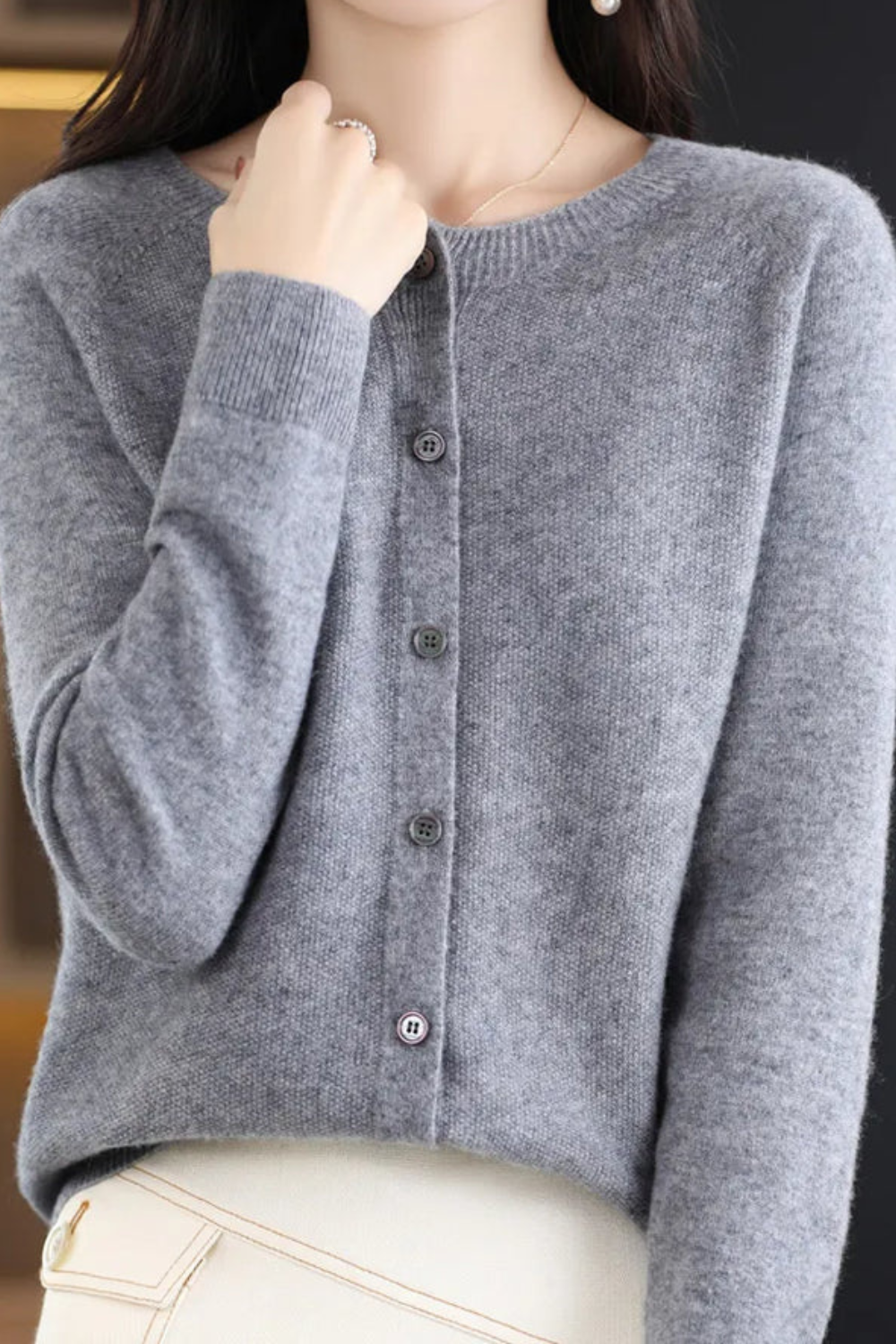 Women's long-sleeve button-front cardigan with round neckline and ribbed trims