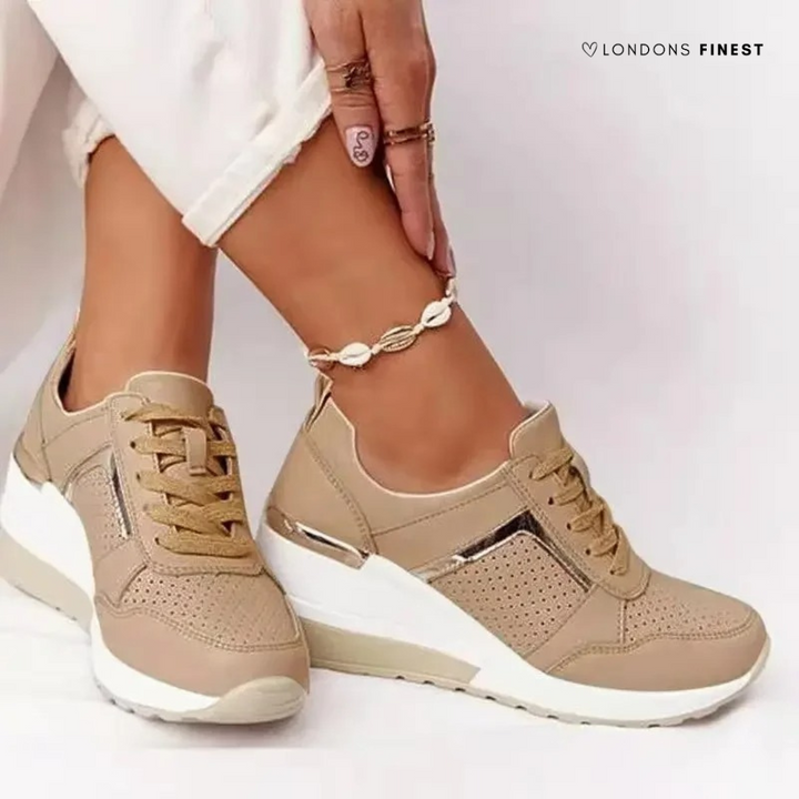 Women's platform wedge sneakers with perforated panels and lace-up front