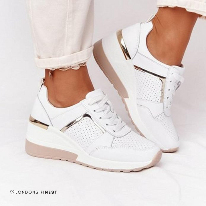 Women's platform wedge sneakers with perforated panels and lace-up front