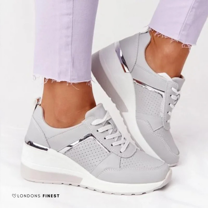 Women's platform wedge sneakers with perforated panels and lace-up front