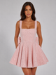 Women's pink sequin fit and flare mini dress with square neck and large back bow