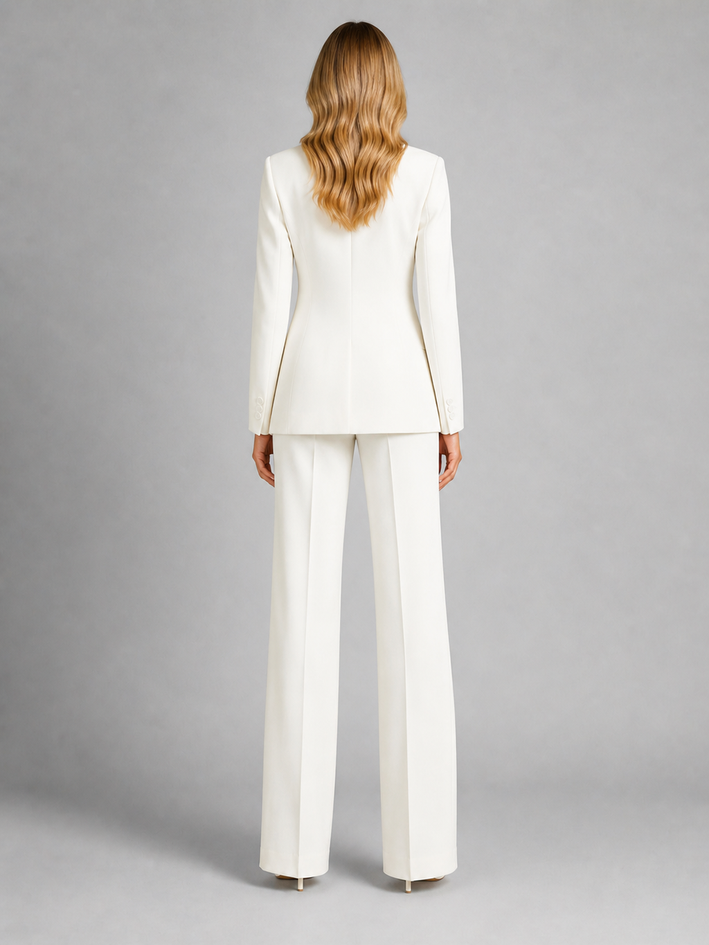 Women's tailored blazer and wide-leg trousers set with notched lapels and flap pockets