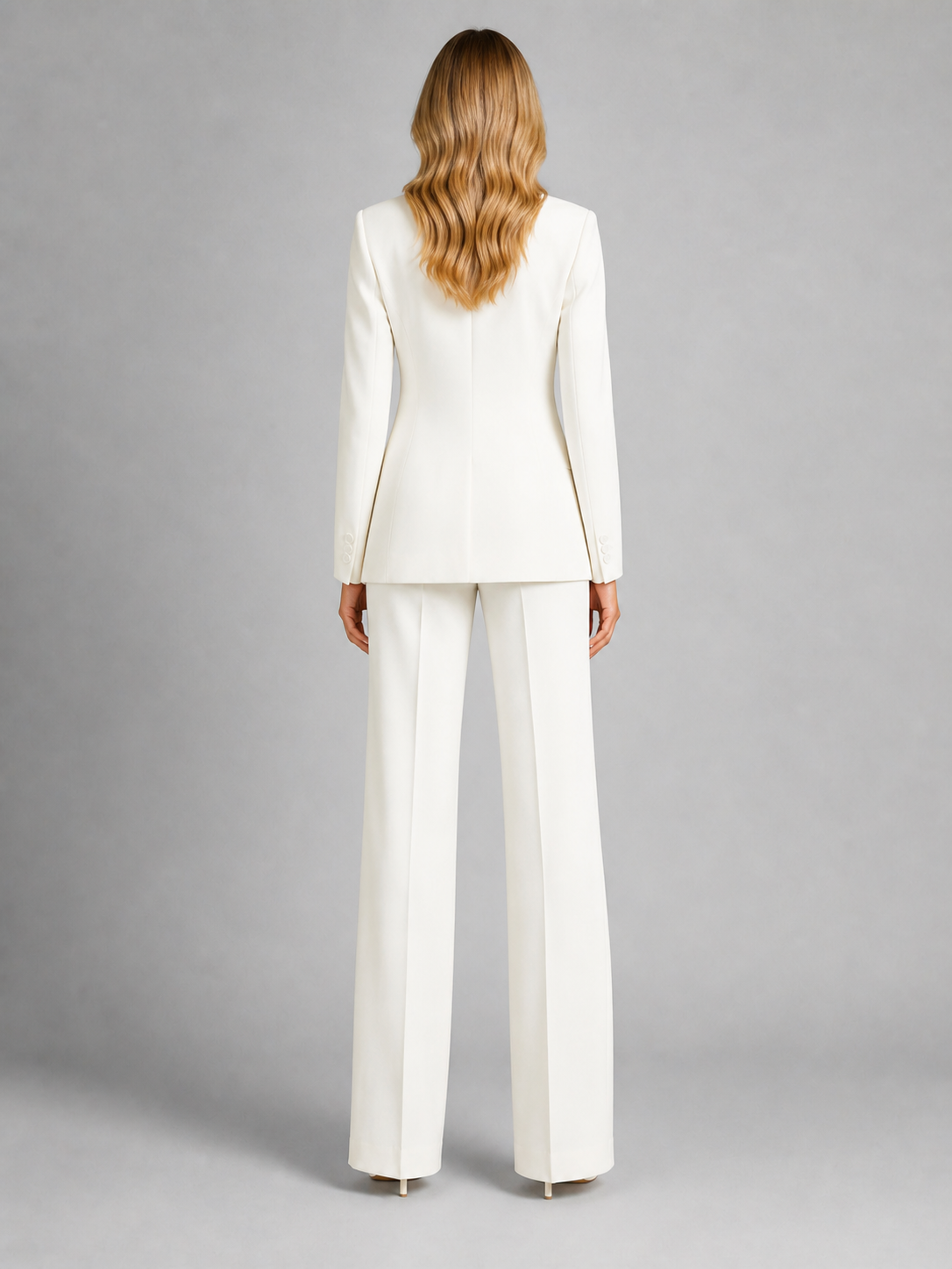 Women's tailored blazer and wide-leg trousers set with notched lapels and flap pockets