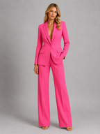 Women's tailored blazer and wide-leg trousers set with notched lapels and flap pockets