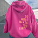 Women's pink sherpa fleece hoodie with a slogan print on the back