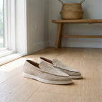 Men's slip-on loafers with moc toe and flat white sole