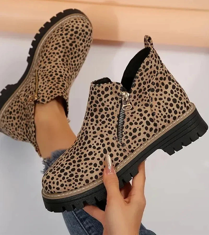 Women's ankle boots with side zips, rounded toes and chunky lug soles