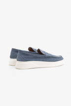 Blue moccasin loafers with penny straps and white platform soles