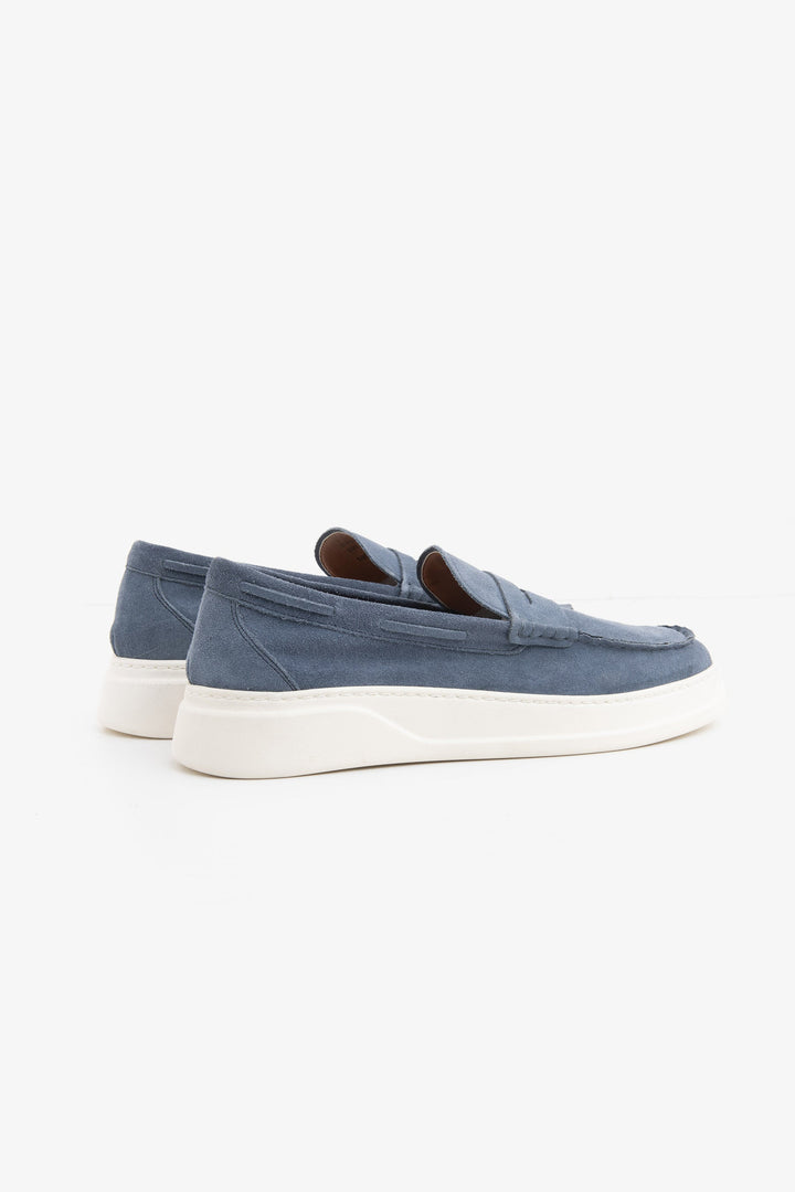 Blue moccasin loafers with penny straps and white platform soles