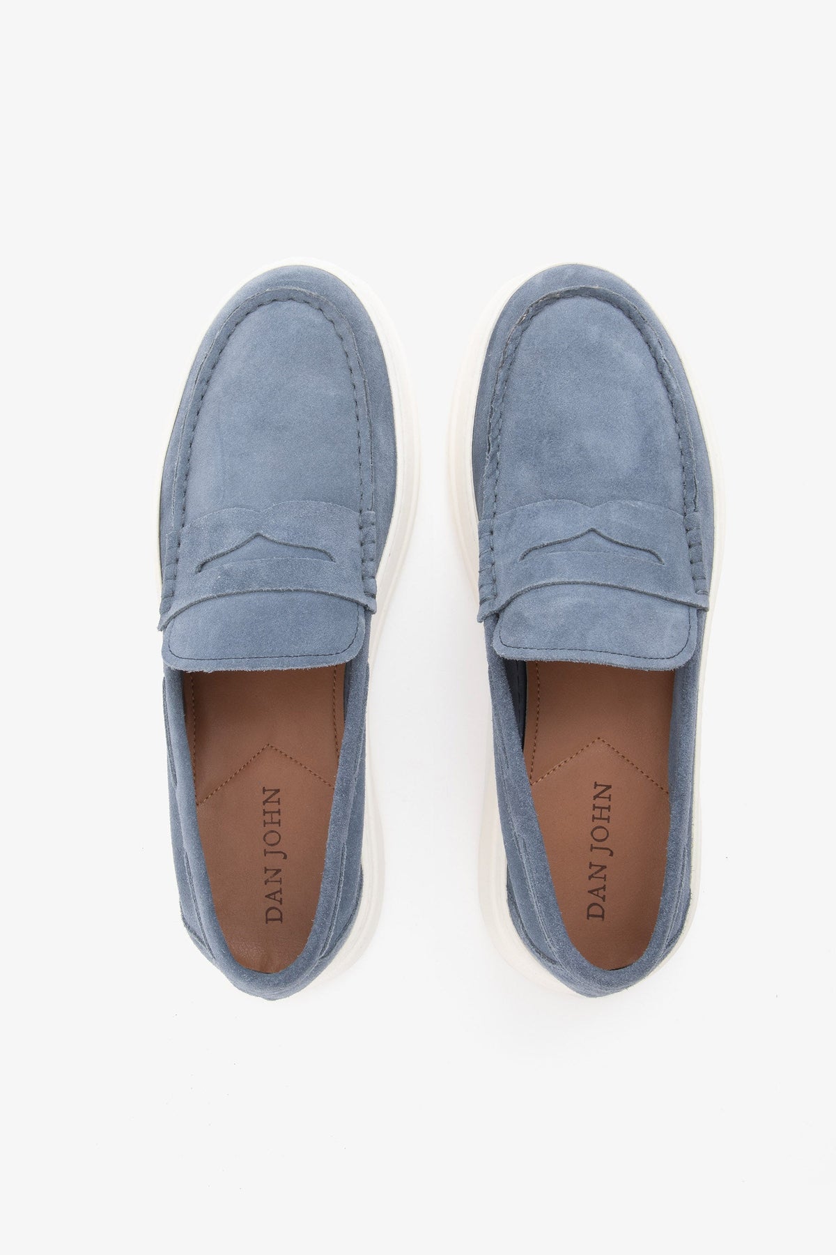 Blue moccasin loafers with penny straps and white platform soles