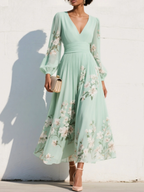 Light green floral pleated midi dress with V-neck and long sleeves