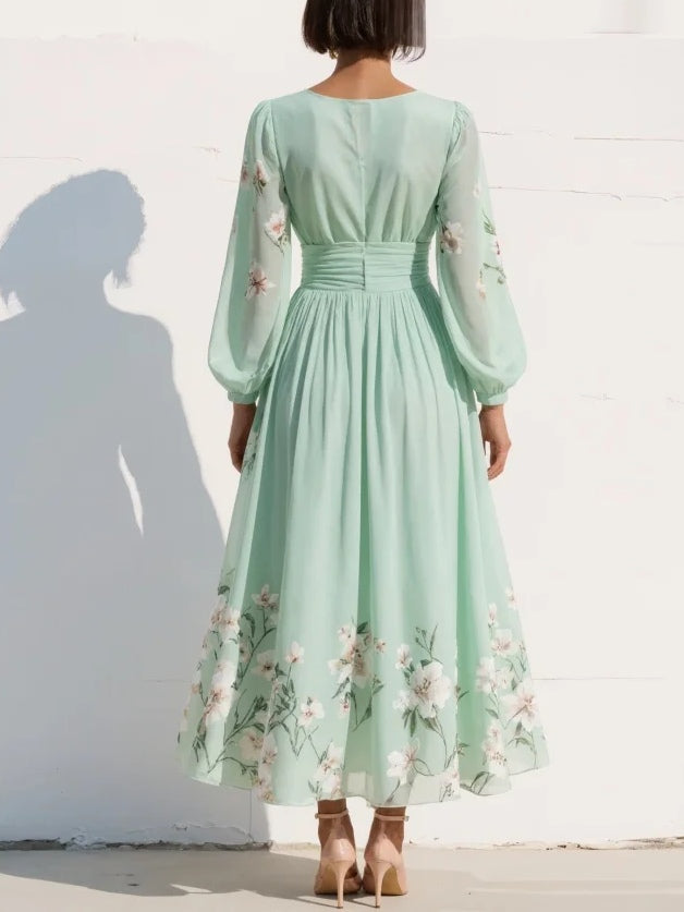 Light green floral pleated midi dress with V-neck and long sleeves