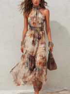 Women's floral halter midi dress with smocked waist