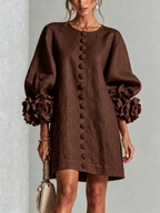 Textured button-down mini dress with long balloon sleeves and floral cuffs
