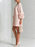 Pink mini dress with long sleeves, flower buttons and large floral cuffs