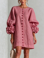 Textured button-down mini dress with long balloon sleeves and floral cuffs