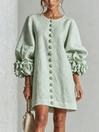 Textured button-down mini dress with long balloon sleeves and floral cuffs