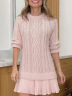 Women's cable-knit mini sweater dress with crew neck, long sleeves and pleated hem