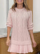 Women's cable-knit mini sweater dress with crew neck, long sleeves and pleated hem