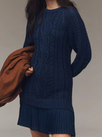 Women's cable-knit mini sweater dress with crew neck, long sleeves and pleated hem