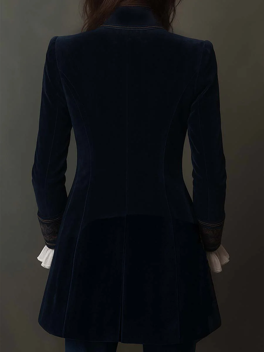 Women's navy longline jacket with floral embroidery, stand collar and long sleeves