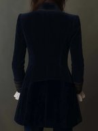 Women's navy longline jacket with floral embroidery, stand collar and long sleeves