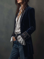 Women's navy longline jacket with floral embroidery, stand collar and long sleeves