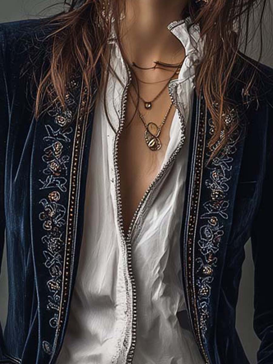 Women's navy longline jacket with floral embroidery, stand collar and long sleeves
