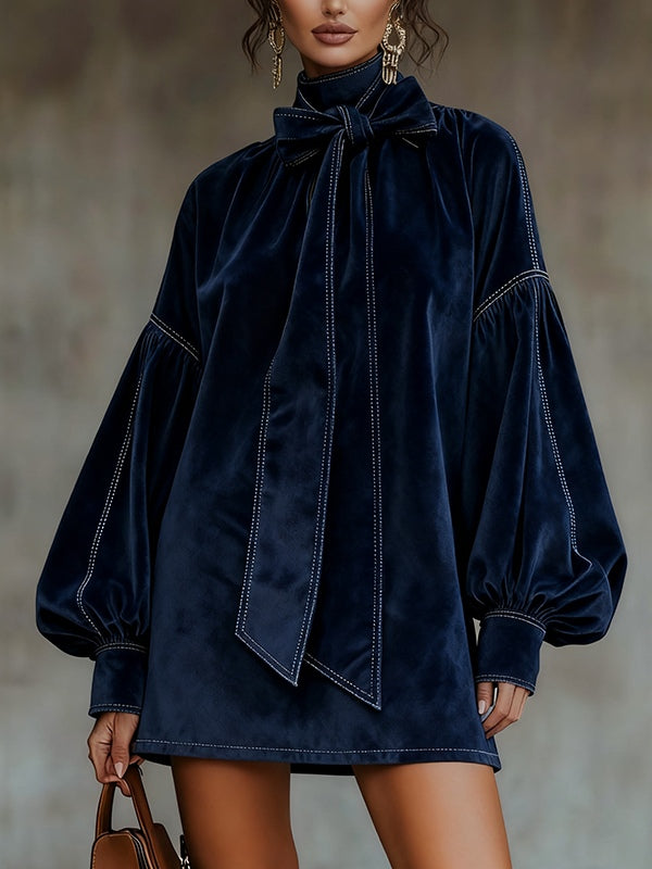 Women's navy velvet mini dress with bow and lantern sleeves