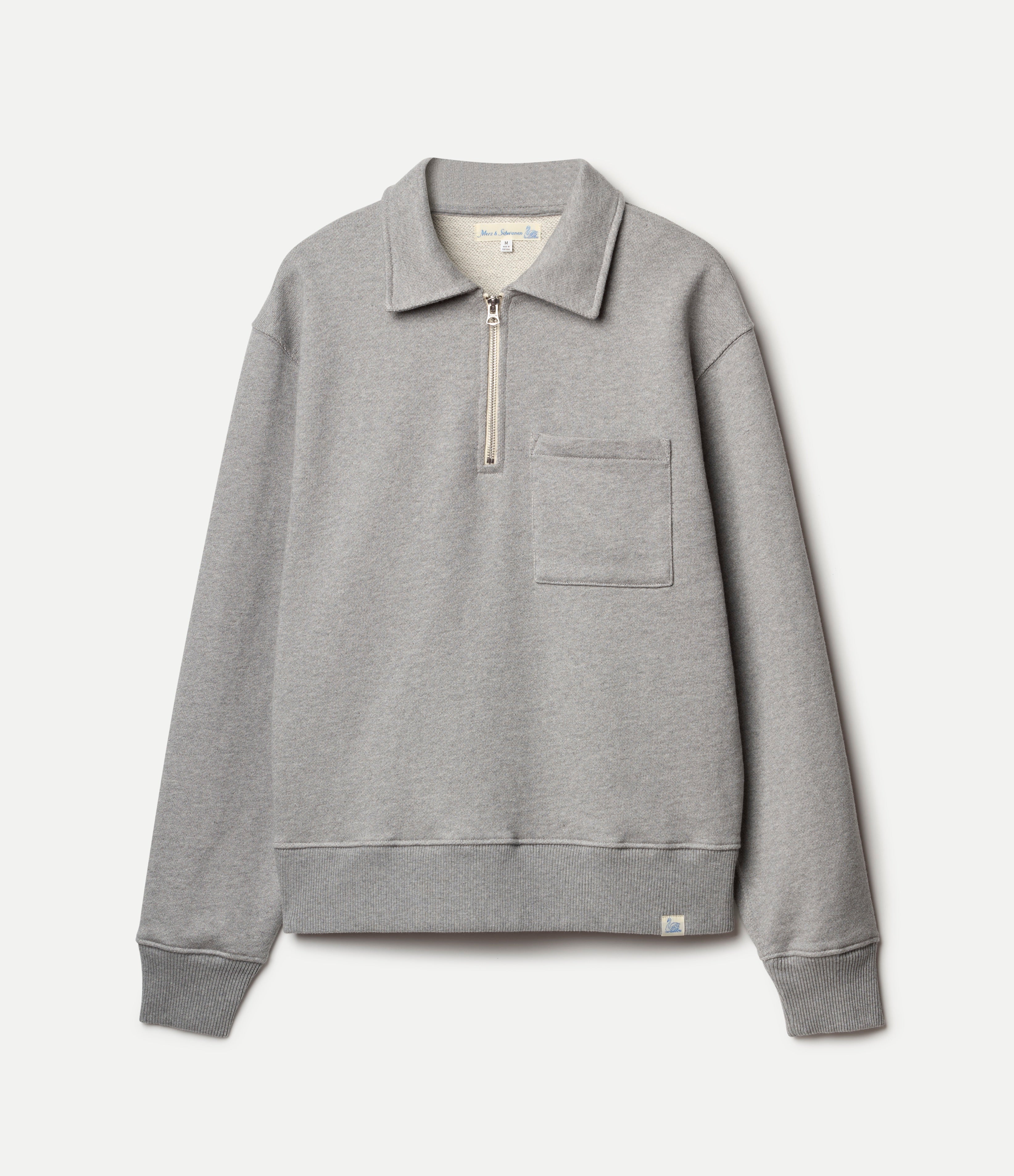 Men's gray half-zip polo sweatshirt with chest pocket