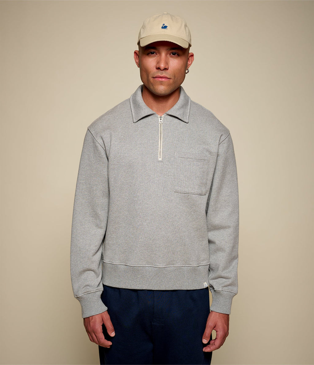 Men's gray half-zip polo sweatshirt with chest pocket