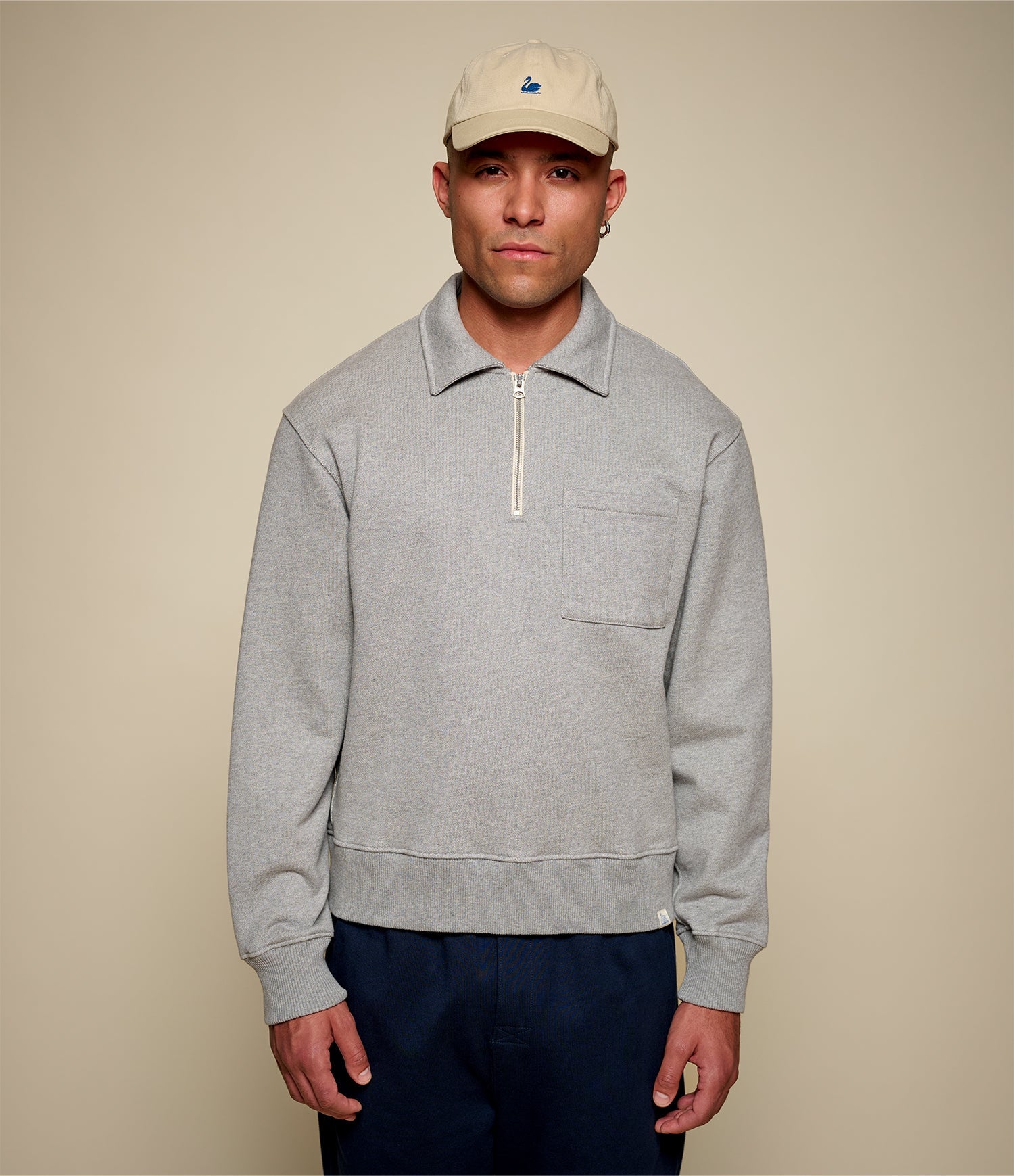 Men's gray half-zip polo sweatshirt with chest pocket