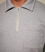 Men's gray half-zip polo sweatshirt with chest pocket