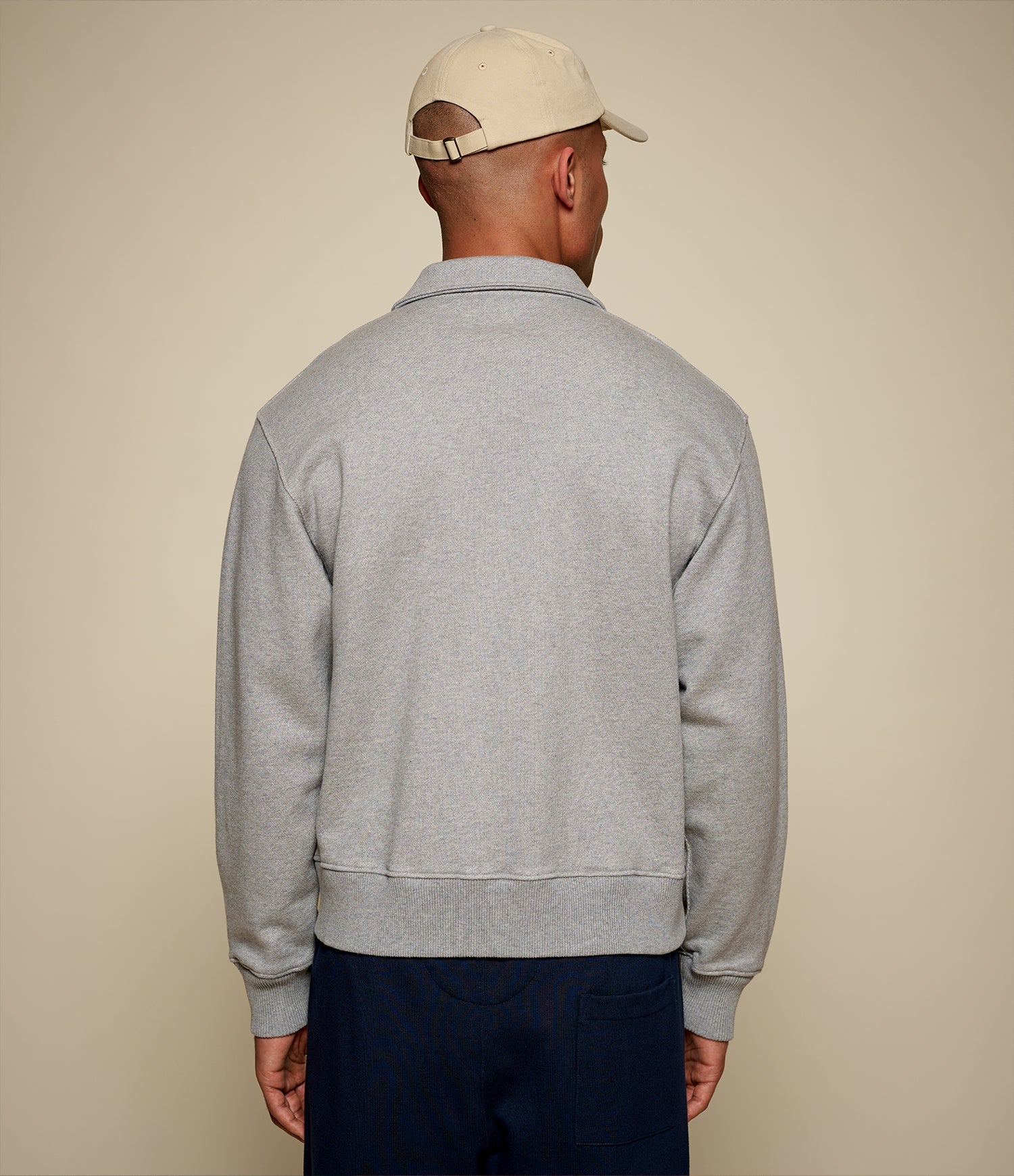 Men's gray half-zip polo sweatshirt with chest pocket