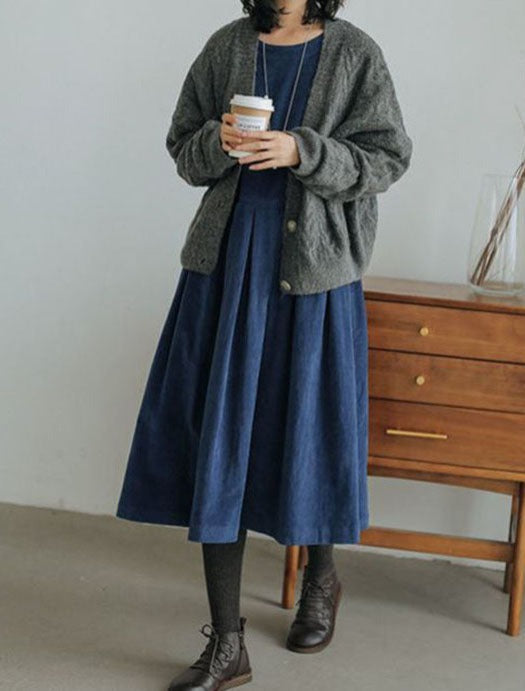 Women's long-sleeve velvety midi dress with a round neckline and full gathered skirt