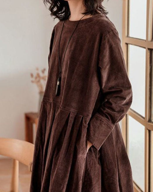 Women's long-sleeve velvety midi dress with a round neckline and full gathered skirt