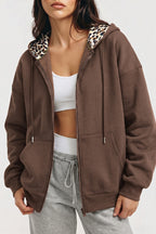 Women's oversized zip hoodie with leopard-lined hood and front pockets