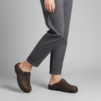 Unisex closed-toe clog sandals with buckle straps and contoured footbeds