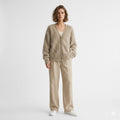 Women's fluffy V-neck button-front cardigan with long sleeves and patch pockets