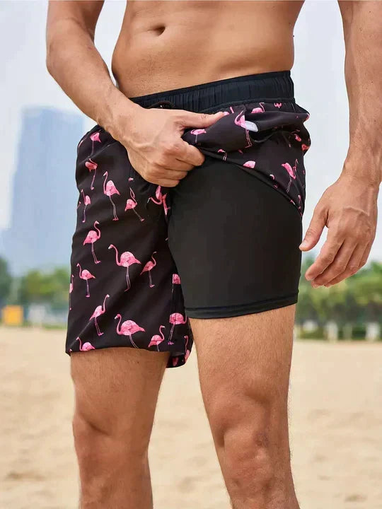 Men's slim fit swim shorts with printed pattern and interior lining, drawstring waist