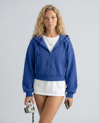 Women's cropped hooded zip-up hoodie with long sleeves and front pockets