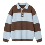 Men's black and cream striped polo sweater with long sleeves and button placket