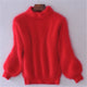 Women's fluffy turtleneck sweater with long sleeves and ribbed trims