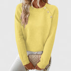Women's long-sleeve crew neck jumper with shoulder buttons and cropped hem