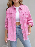 Women's pink distressed denim jacket with pockets and frayed hem
