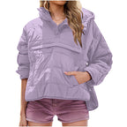 Women's oversized hooded quilted pullover jacket with long sleeves and front pockets