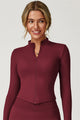 Women's fitted cropped jacket with high collar and front zip